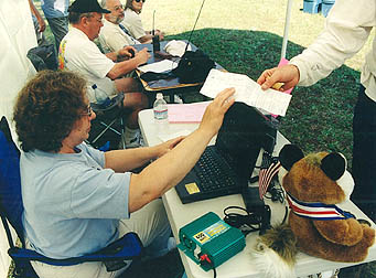Turning in a competitor card at 2002 championships